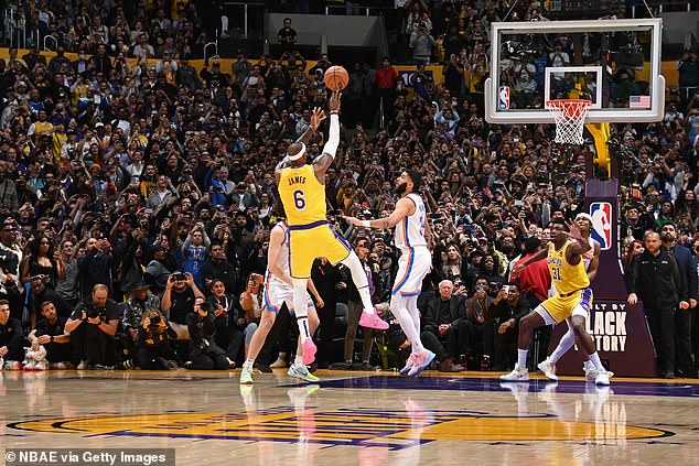 Phil Knight (front centre) was one of the only people in the room watching the action with his own two eyes